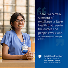 Portrait of a smiling Anjali in blue scrubs