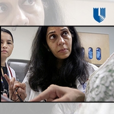 Dr. Priya Kishnani and colleague examine patient