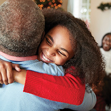 Child hugging grandparent