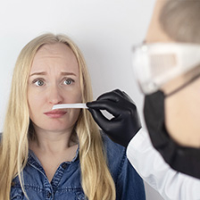 Doctor presents smell test to patient