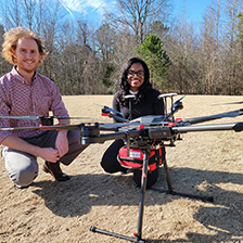Image of Dr. Monique Starks and drone operator Evan Arnold