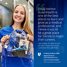 Lindsey smiling with prizes at Duke University Hospital