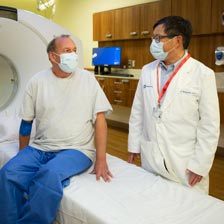 Doctor and man talking