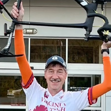 Cyclist Holding Bike for IG