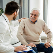 Man smiling at doctor