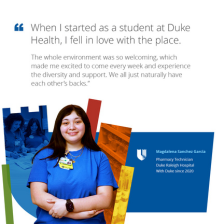 Magdalena smiling in a Duke blue shirt with a colorful Duke shield in the background.