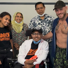 Family poses with pro wrestler