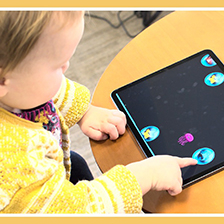 Child playing with tablet