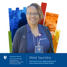 Saundra smiles in glasses and a Duke Health polo. 