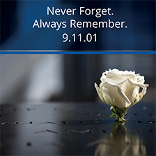 Message with never forget, always remember and 9-11-01 with a rose on a memorial
