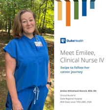 Emilee smiles in blue scrubs in a nature setting.