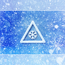 Weather alert image snowflake in a triangle