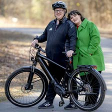 Mark Schreiner and his wife Jennifer Gaspar Schreiner pose on the Neuse River Greenway Trail in Raleigh, NC.