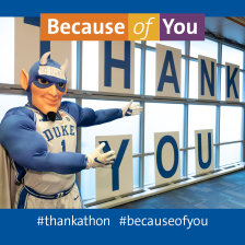 The Duke Blue Devil in front of a Thank You sign