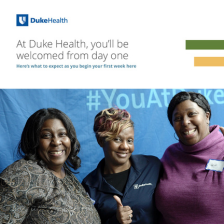 Three female team members smile together at the Duke Health Mixer for new hires. 