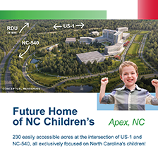 Child appears in foreground of a site map for the future home of NC Children's hospital in Apex with directional signage