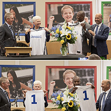 Executives present sports jerseys to elected officials at the NC Children's campus announcement