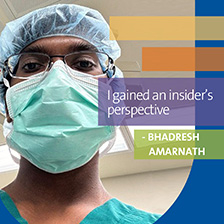 A medical student appears in a mask and cap with the saying I gained an insider's perspective with the name of Bhadresh Amarnath