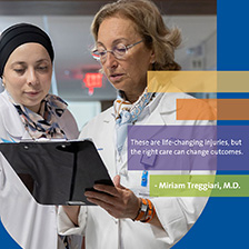 Two physicians consult in a hospital setting