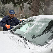 Duke Health colleague scrapes a vehicle window