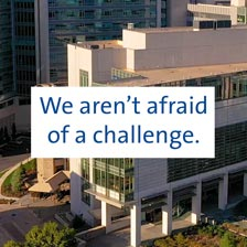 "We aren't afraid of a challenge" is written with Duke in the background