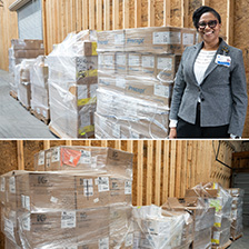 Jennifer Williams poses with shrink-wrapped donations on pallets in a warehouse setting
