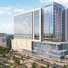 Conceptual art of the NC Children's hospital complex, a building on a street with trees nearby.