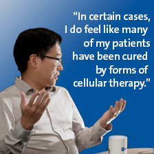 Dr. Lin is looking to the side discussing cell therapies and curing cancer