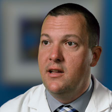 Dr. Overbey looks at the camera